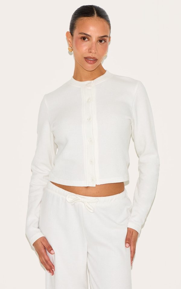 09912958ff166524374259fdbe319be4c3ed5c2b_CNM8998_1_petite_cream_super_soft_button_down_long_sleeve_top
