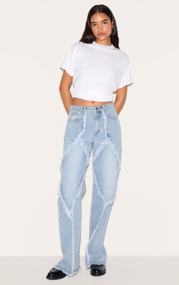 0adb7aaa3546f089df5e95a217ba2bf90922509e_CNM1188_1_tall_light_blue_wash_mid_rise_raw_seam_detail_wide_leg_jeans