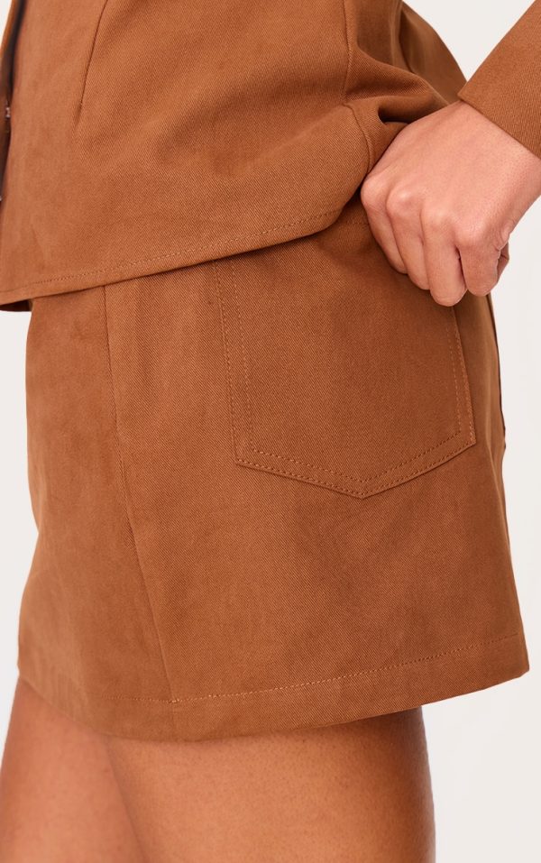 0c4a81e59d1fecee49dbc1b1b35ea1220426cf8c_CNL6539_4_tan_twill_mid_rise_mini_skirt-1