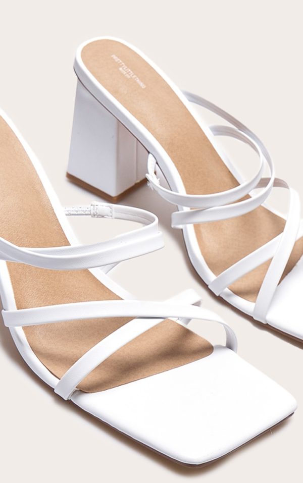 0e647f3db20e8db2c77897b985d24b0155014484_CNJ1541_4_white_pu_wide_fit_square_toe_strappy_block_heeled_mules