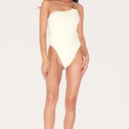0ea2667636411064669e648e16898273a32e4671_CND4509_3_sand_gold_trim_asymmetric_swimsuit