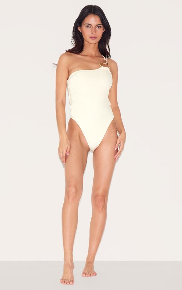 0ea2667636411064669e648e16898273a32e4671_CND4509_3_sand_gold_trim_asymmetric_swimsuit