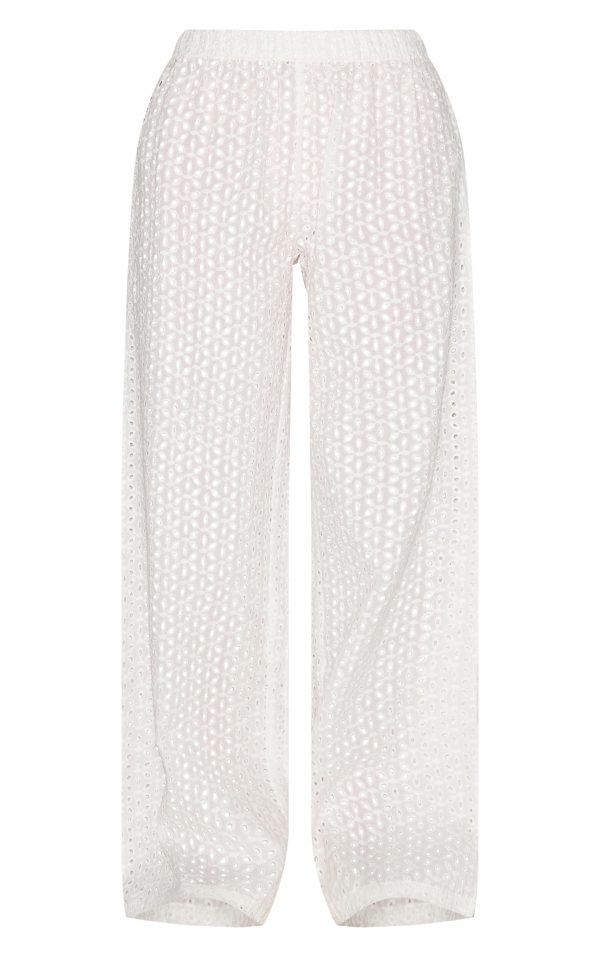 100c17baee3994c9f53a30440abd5d0f8f7dae66_CNM3200_5_white_embroidered_mid_rise_trousers
