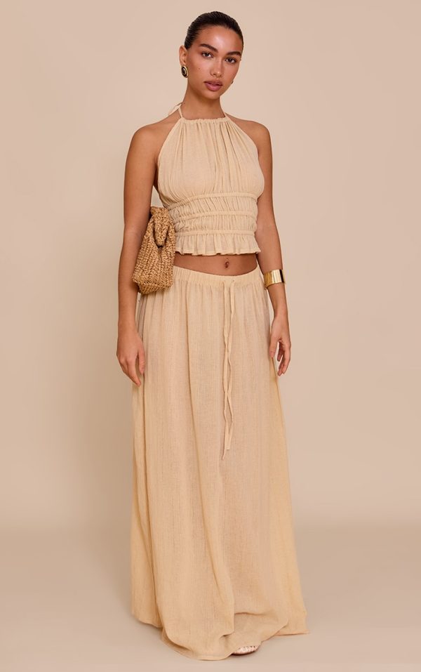 101636ef33bce66a5a3bf64c649c1570d629cedf_CNM6322_1_sand_mid_rise_textured_maxi_skirt