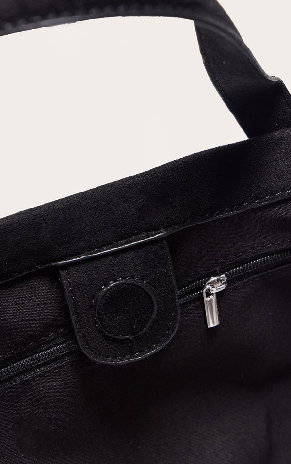 12b79f134717756d23e5df97053725810bc7114a_CNL9836_4_black_faux_suede_elongated_hand_bag