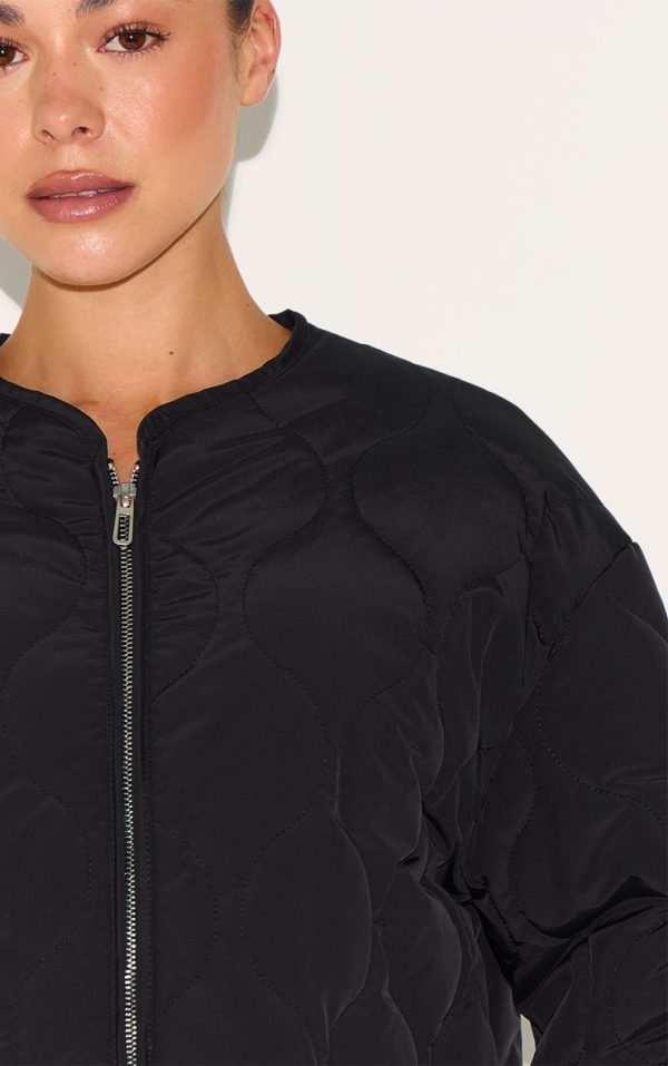 16927a5023f9af7700dbb410234da9e4beb1bccf_CNM1417_4_black_zip_up_quilted_jacket