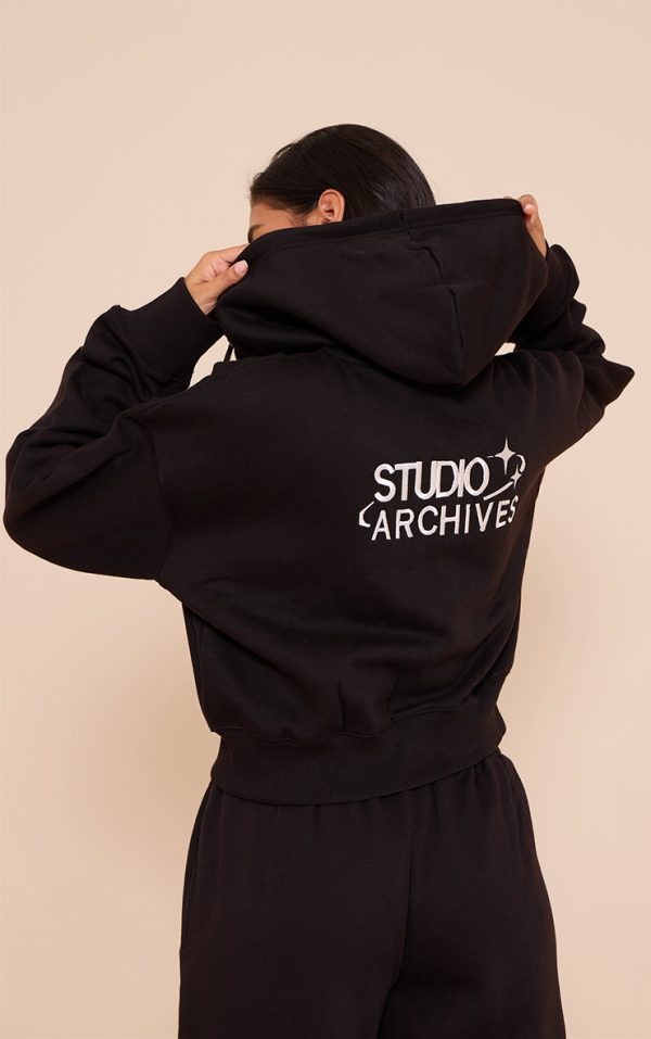 19c85688e69e24e16bdef57a5301b3361ff5369d_CNL1555_1_black_studio_archives_embroidered_zip_up_jacket