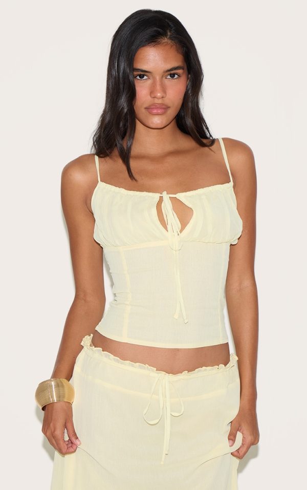 1b800cbf9e41b1f12cfdd97ad0e0ce385dce1303_CNM3224_1_butter_yellow_chiffon_ruched_bust_cami_top