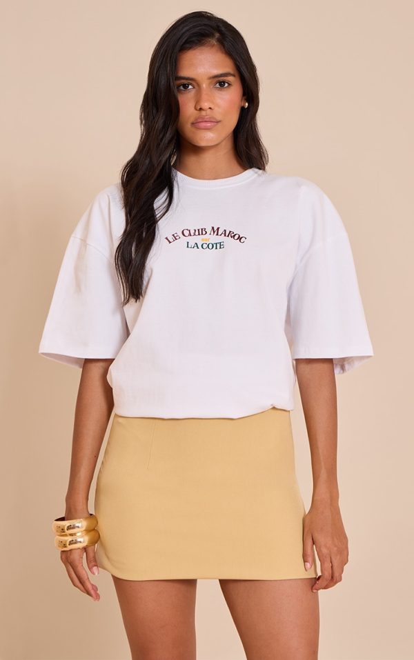 1cdfc4c0437488f394c4a1c58fd38197d7e985b6_CNM0101_1_butterscotch_woven_a_line_mini_skirt-1