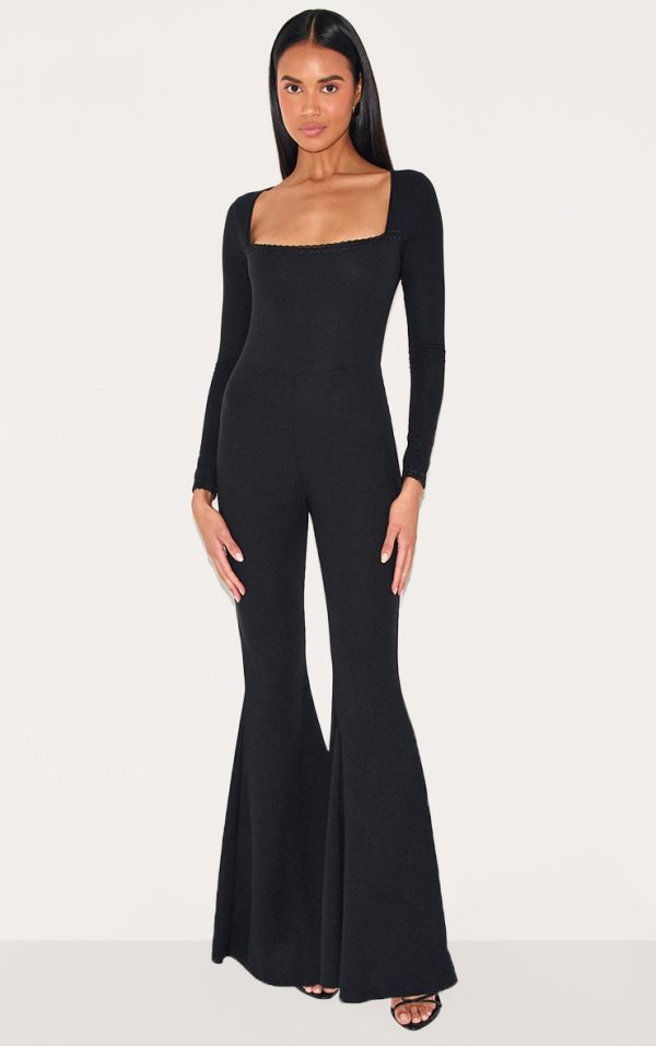 1f2f6006c48226d657e4f2d87234a2093bdf9ac9_CND1929_1_black_ribbed_lace_trim_long_sleeve_flared_leg_jumpsuit