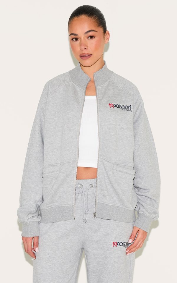 1f830012a5729005bb04db3ba52a4c08a4929d34_CNL9687_1_ash_grey_embroidered_boxy_track_top