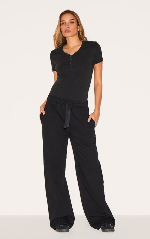 218638dd9a5eff16e301bfea71c057bfc52eb7e7_CNL8033_3_black_premium_interlock_button_down_short_sleeve_bodysuit