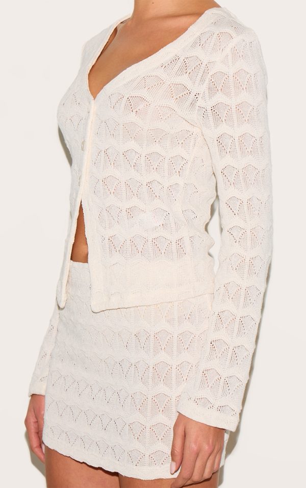 222090c3bad3a192985c7f6ddd999835363ac6d5_CNM7412_4_almond_textured_button_up_flared_sleeve_cardigan