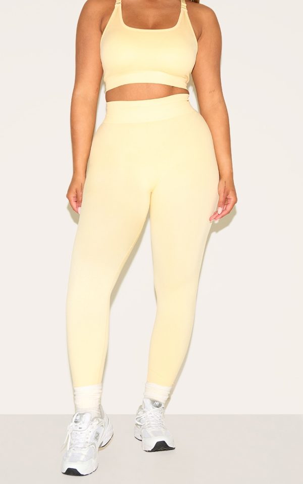 2279719c599e78796d90bd78f0bdb251df54c6a0_CNM8520_2_shape_butter_yellow_seamless_active_ruched_bum_high_waisted_leggings