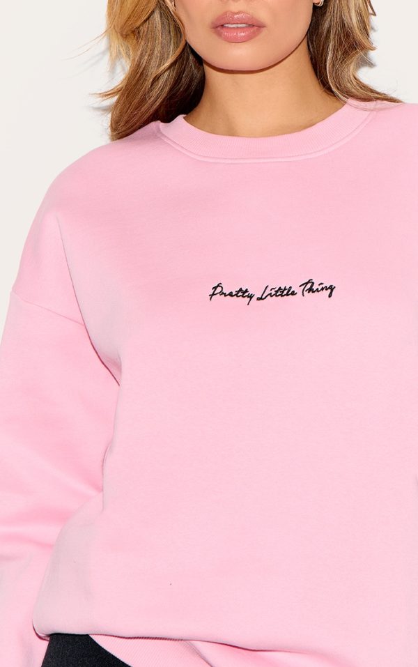 2306593b055b6aa57aaf8d9c660244a3120d13be_CNG1262_4_prettylittlething_baby_pink_basic_oversized_sweatshirt