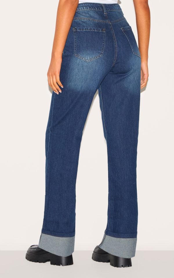 24f0ed6be91ae7880820f3b4e05d8b966552d86b_CNJ2048_3_tall_dark_indigo_mid_rise_distressed_turn_up_hem_jeans
