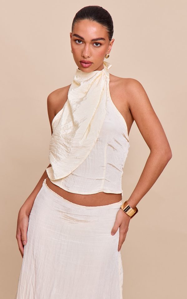 2505278d83018f1fb1f781136ac341707447a57c_CNM8811_1_butter_yellow_textured_woven_halterneck_top