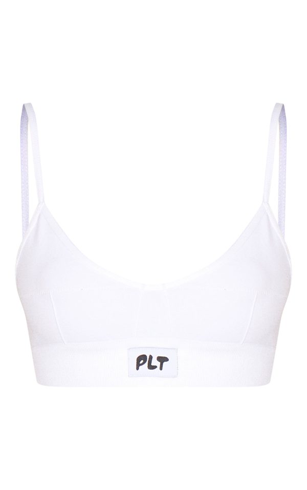258be39d73c482088f50587befc26e9708cae1d6_CNK6345_5_prettylittlething_white_woven_badge_seamless_bralette
