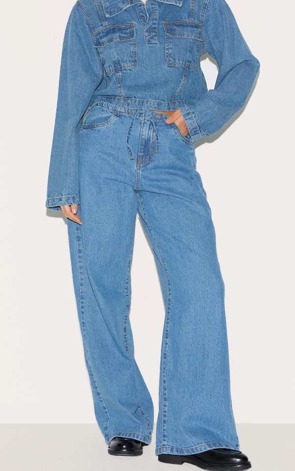 26f413f8c5f2570e1aaf2b60d6e5f09915341ced_CNL6630_2_mid_blue_wash_low_rise_tie_waistband_wide_leg_jeans