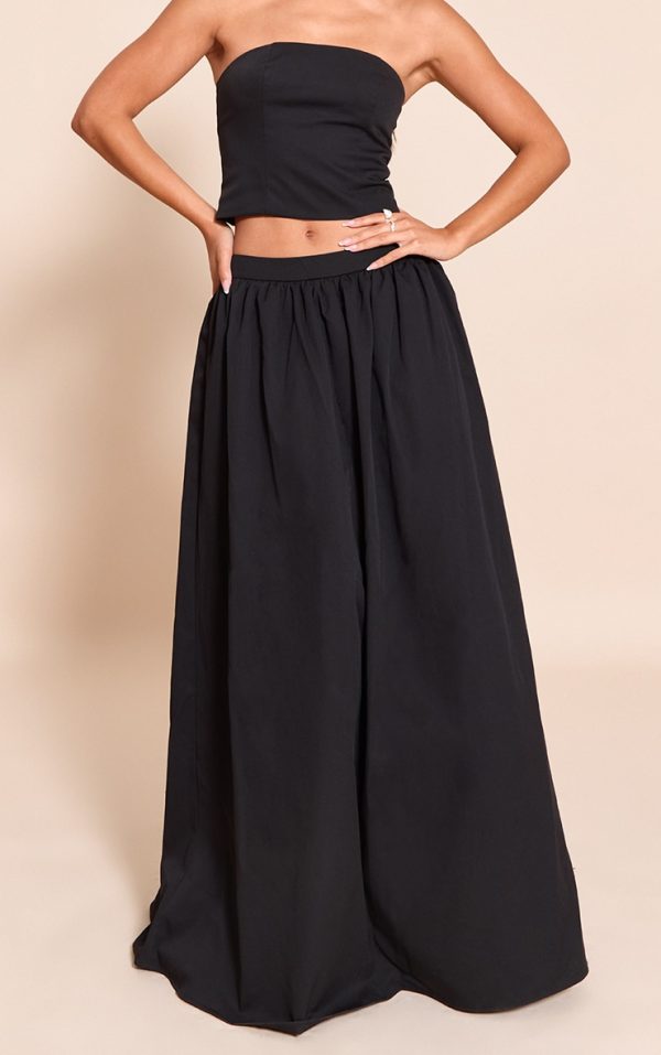 29757d57b82dc9079b7843ad43dccee22944ee17_CNM6147_2_black_woven_band_detail_pleated_maxi_skirt