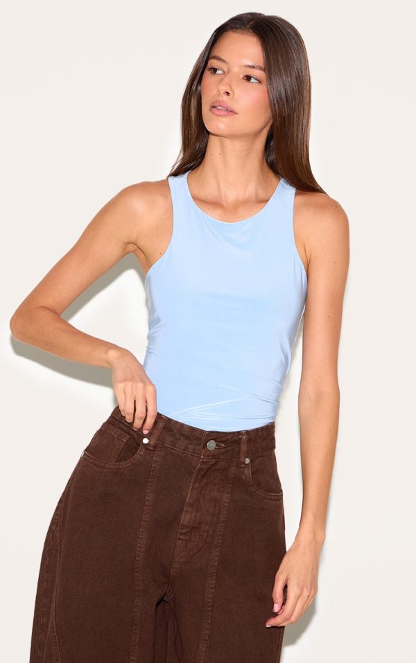2ae2945636f5b95fe2ea9112dce8bd190420eb5d_CNM8403_1_sky_blue_soft_touch_asymmetric_hem_racer_vest
