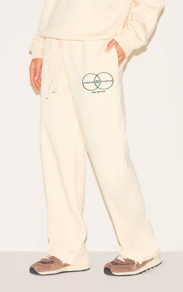3107e5fc95520469fdc2be4f4f9580447c216350_CNL8275_2_cream_circle_wellness_premium_print_straight_leg_joggers