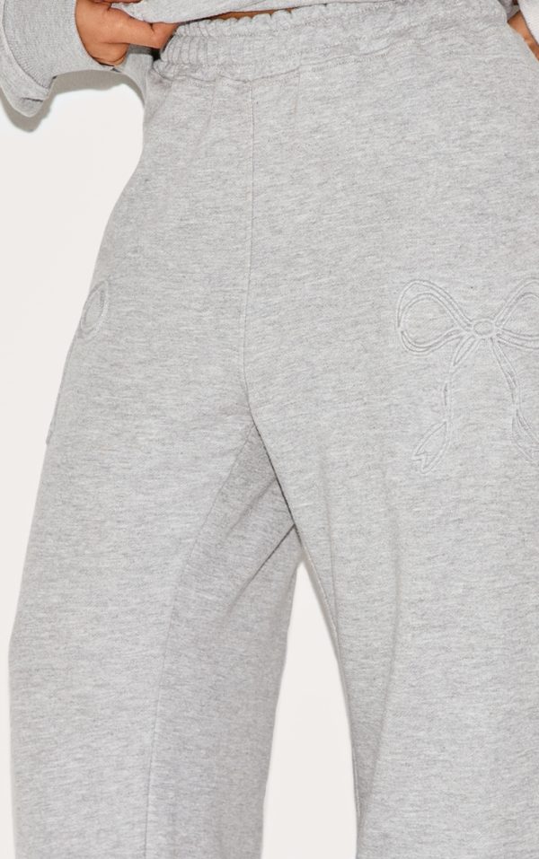 31f24cec462867e5b4e053db87b3cab5bfa12ff9_CNK8297_4_petite_grey_marl_embossed_bow_detail_wide_leg_joggers