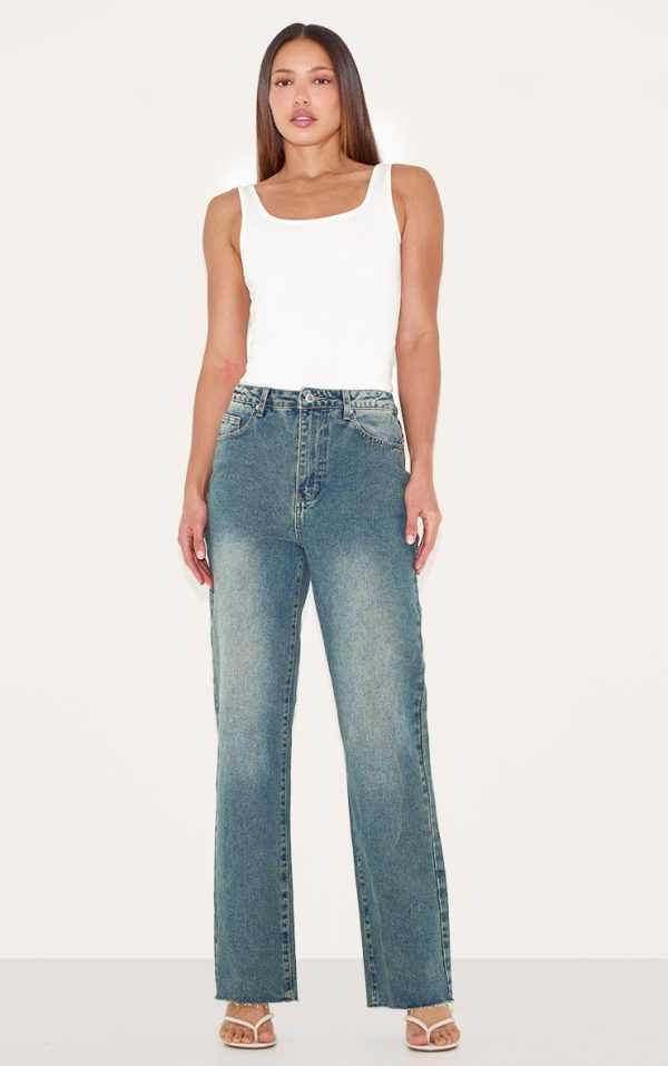 34adc37136dffb422343ea696fad27aeb7b0b0ad_CNL4608_1_tall_indigo_vintage_wash_frayed_hem_wide_leg_jeans