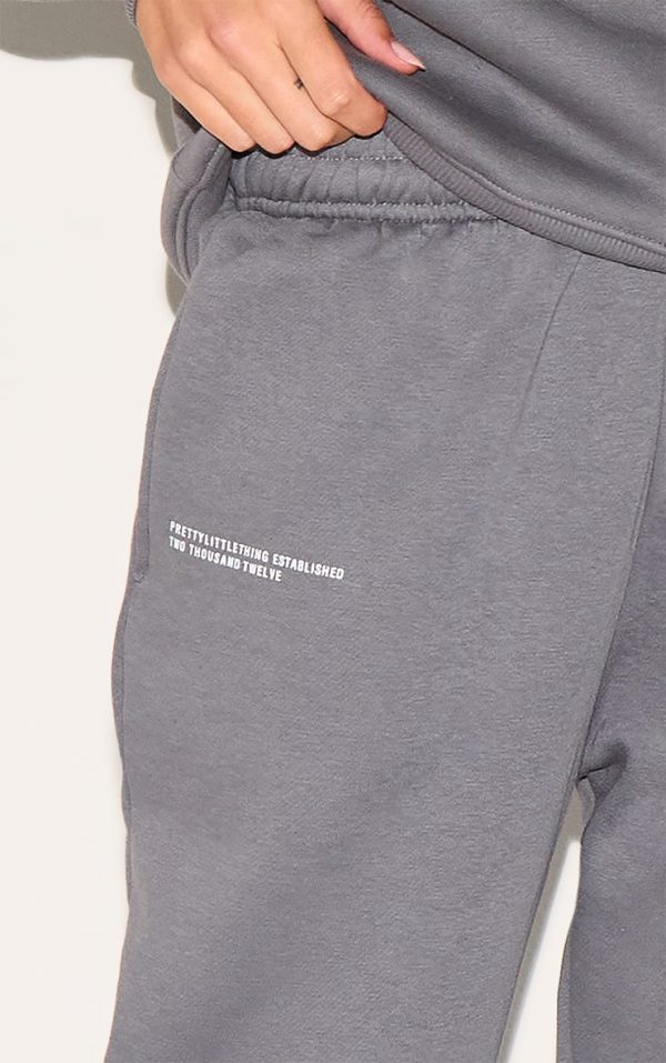 3b9837d3ab1d314fd49377ecf44d539ff32c4d71_CNE5363_4_prettylittlething_logo_charcoal_grey_est_2012_cuffed_joggers