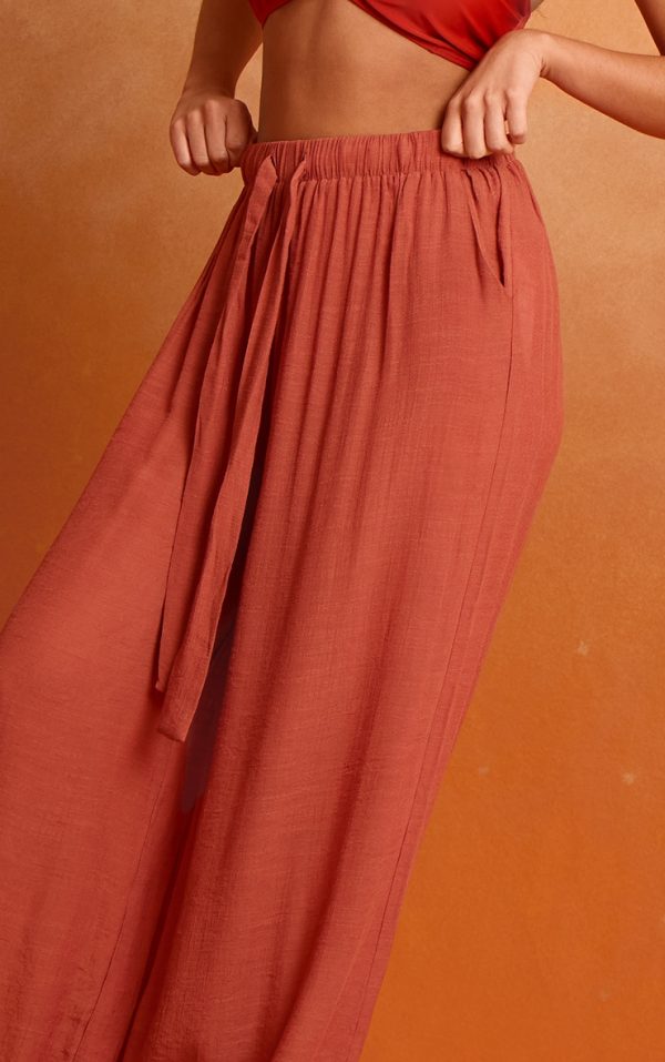 3ede95b1752b2d4e256ebc6c62d5b2138ff122f5_CNN1445_4_rust_linen_look_palazzo_beach_trousers
