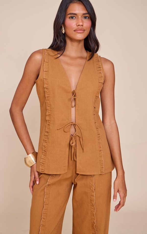 43862d4a27c09587859c6a1d78fbde2d0145cf48_CNM3936_1_tan_tie_front_sleeveless_top