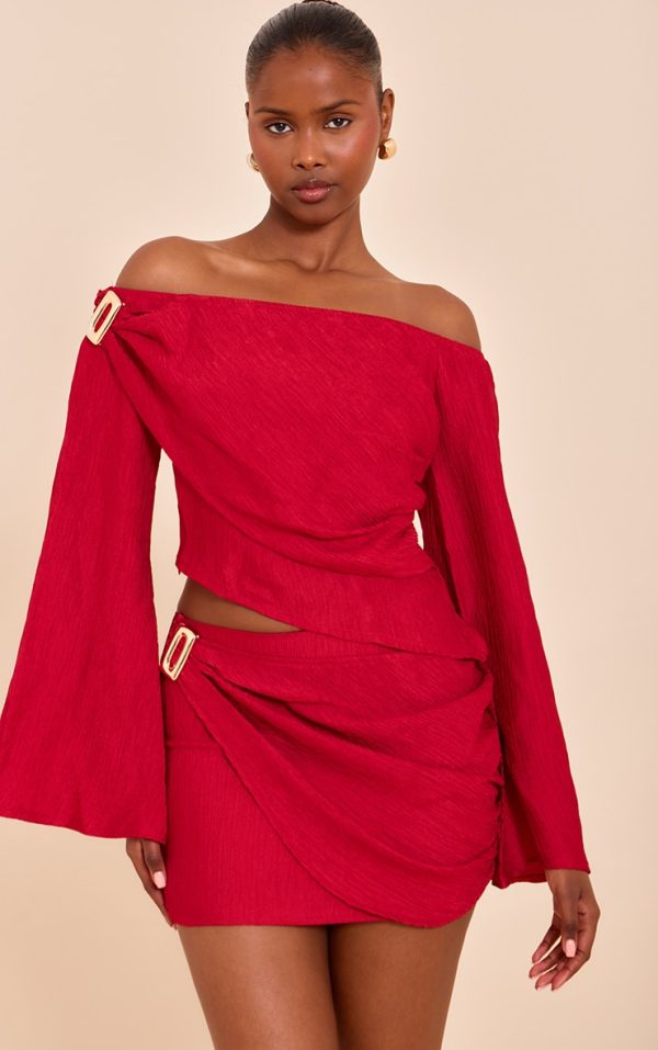 43da1e095a60ce502a687a59257432d4643e1412_CNM8799_1_tomato_red_textured_gold_detail_bardot_long_sleeve_top