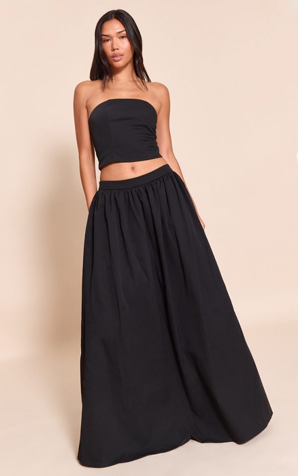471c16edd84f118b0b131f6ccb0fc18f50e9e7e2_CNM6147_1_black_woven_band_detail_pleated_maxi_skirt