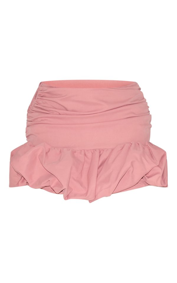 4c3358a6677bd04a12752ed40619a3e79ed9508d_CNM6474_6_shape_rose_ruched_dropped_hem_puffball_mini_skirt