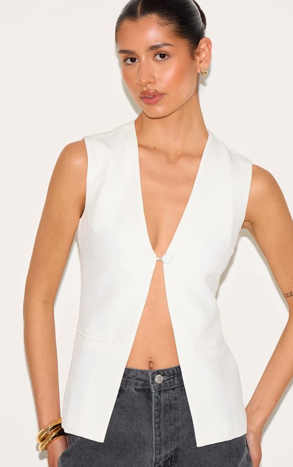 4d1c80a868f97aa1f8de6ebde4b92d7a737c704a_CNM1101_4_tall_white_longline_sleeveless_waistcoat