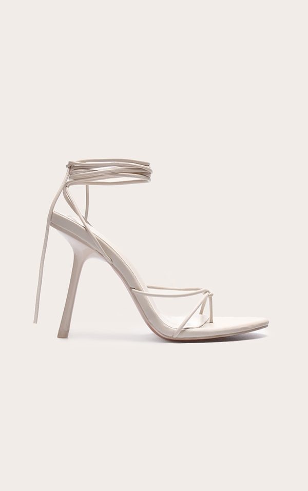 4df7219e5b19d9b878028eae64ee346c877de745_CNL8251_1_plt_label_stone_strappy_tie_thong_heels-1