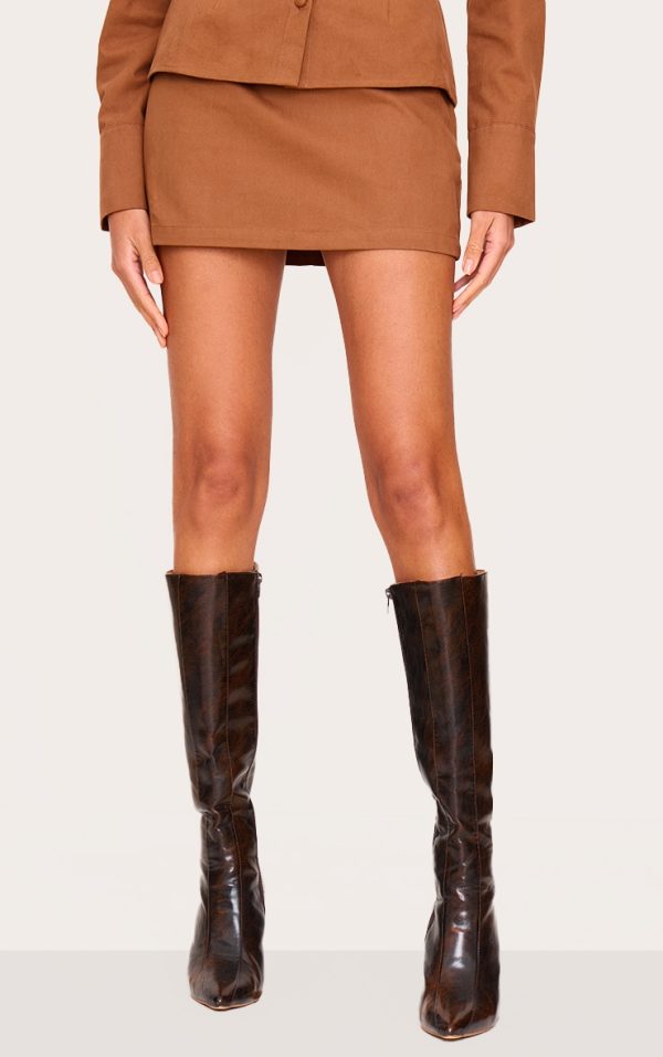 4fb2cc891141941dcba0baf75797ae74a76ba87e_CNL6539_2_tan_twill_mid_rise_mini_skirt-1