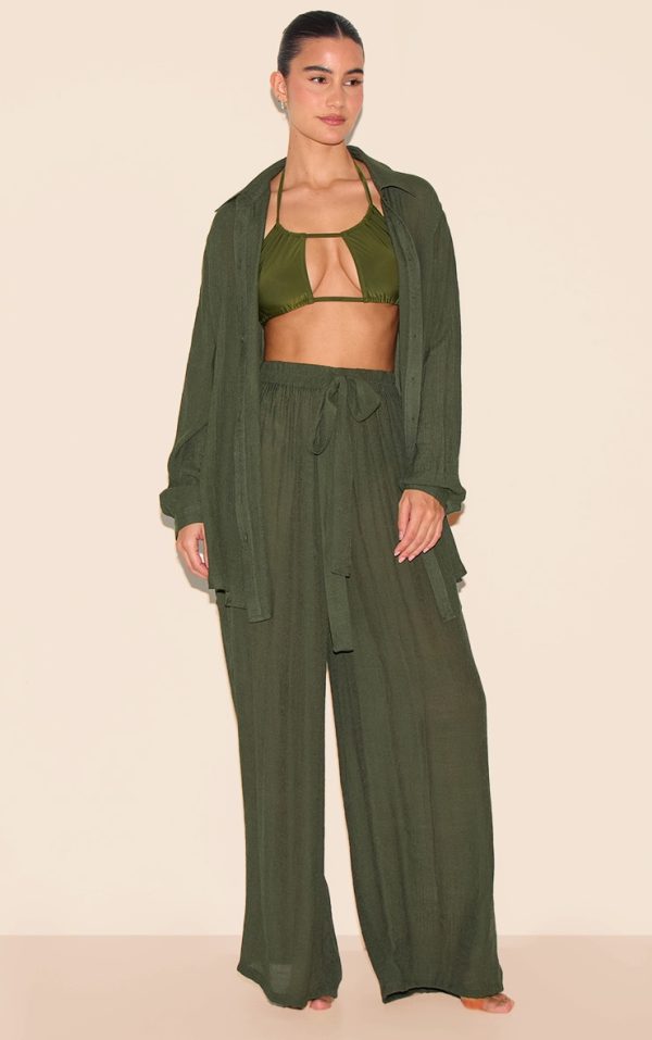 53f5e8391f2000cbf1d9877ec1b0f75500c8be4b_CNL6148_1_khaki_green_textured_woven_palazzo_beach_trousers