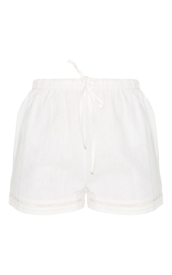 5bac0f7b0f3b9c9d4d41f20bc555ede0ae49fcab_CNM3254_5_white_embroidered_wide_leg_trousers