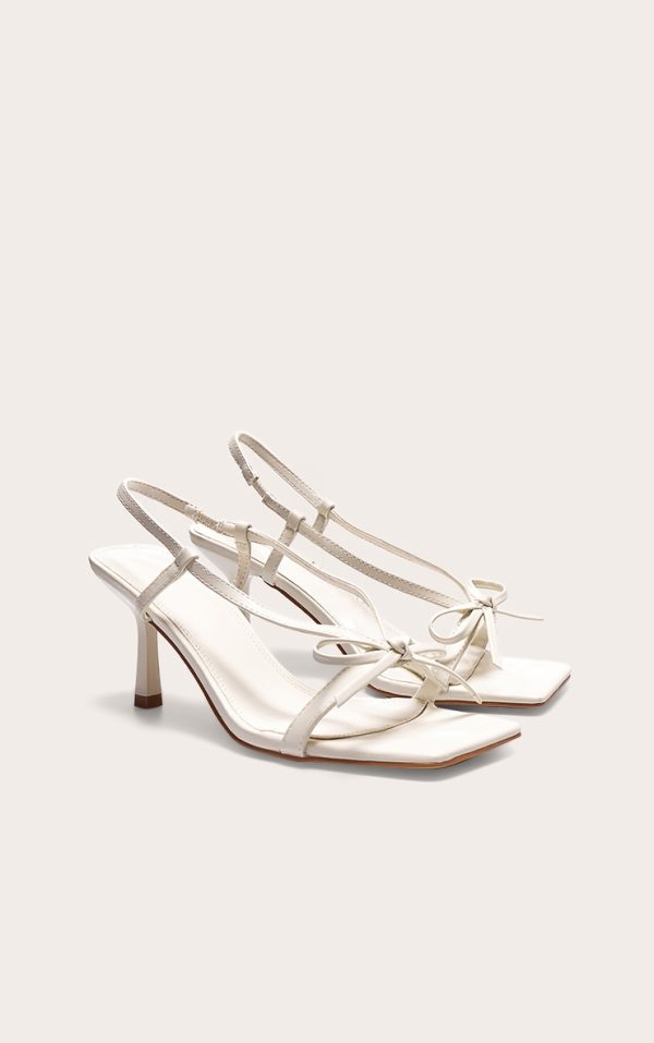 5c9aac5931e1256d9e70f18d18707bf88e7cbec8_CNJ9396_2_cream_pu_square_toe_bow_sling_back_mid_heeled_sandals