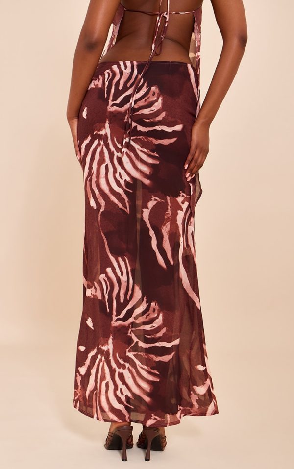 686d48bced3e1d88d6acf1e15d392c27886d03f1_CNM8829_3_brown_chiffon_floral_mid_rise_tie_side_maxi_skirt