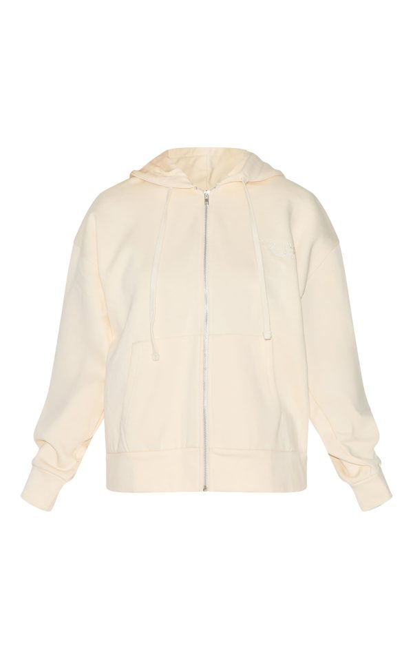 6ade8201721d46c6f1139265ab414b28360fed5e_CNK1748_5_prettylittlething_cream_premium_embroidered_zip_front_oversized_hoodie