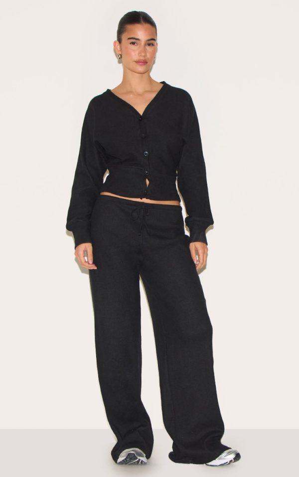 6db47cb58e0019a76b8e5b71a3581b59b22927c6_CNM5261_1_black_soft_ribbed_low_rise_wide_leg_trousers