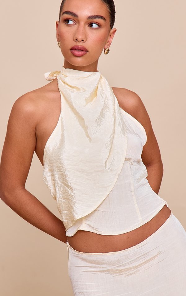 6eed705eb3318fc31b695d263127af217d6a7d5d_CNM8811_4_butter_yellow_textured_woven_halterneck_top