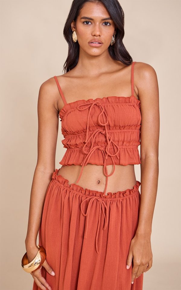 700d79c1b8dccbf294970676988e86e193b56efa_CNM3937_1_rust_cheesecloth_contrast_cami_top