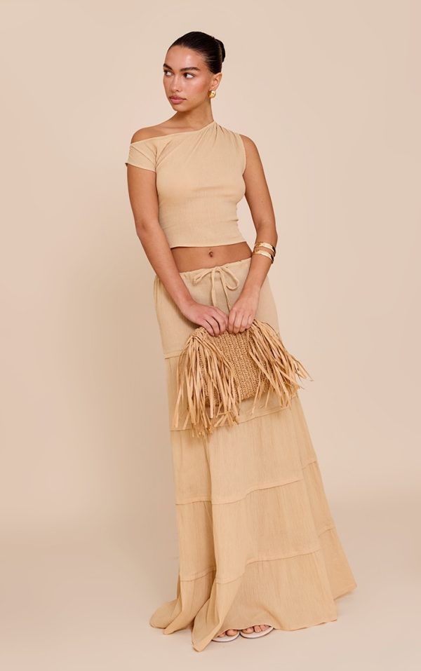 70645f648852a2ca79fa49e2849750f57b1ee056_CNM6088_3_sand_cheesecloth_off_the_shoulder_asymmetric_top