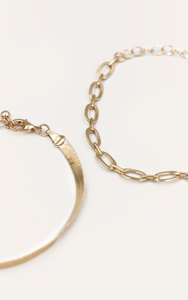 7288e6de7b98895c78c7d656d099597da30cc963_CNN3219_3_gold_multi_layered_chain_bracelet