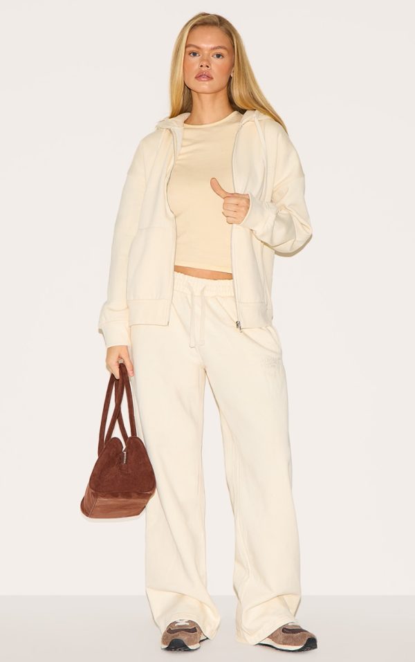 729d3979e40167a3f69effaf6ae01a80738a82d4_CNK1748_3_prettylittlething_cream_premium_embroidered_zip_front_oversized_hoodie