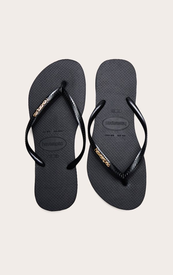 73d3b79ddb90e449c68abccefa1938eb256aadf4_CNM1903_1_black_havaianas_slim_logo_metallic_flip_flops