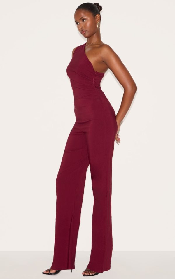 746ab6e7be6291ed4322e1c77a1097bd69f8927a_CNM3112_3_wine_stretch_woven_one_shoulder_ruched_flared_jumpsuit